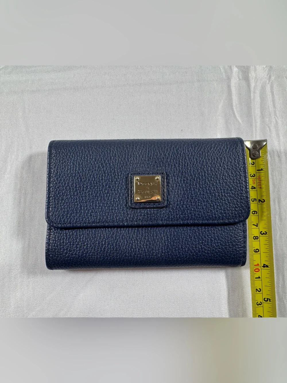 Dooney & Bourke Navy Pebble Leather Wallet with Metal Logo Plaque